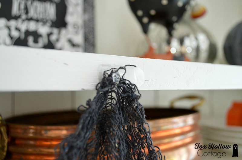 Hang Halloween Decorations from Clear Command Hooks for #damagefreediy - So many possibilities! #sponsored