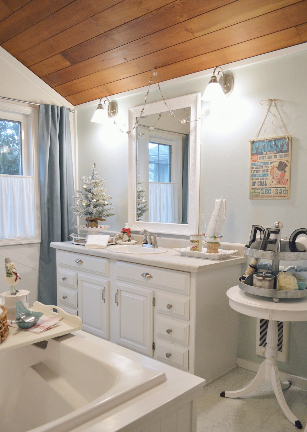 Fox Hollow Cottage Christmas Bathroom - Frosty the snowman theme in aqua and white with galvanized metal and rustic wood.