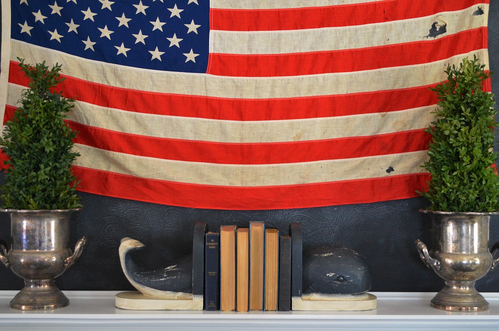 Vintage flag, Whale bookends, silver bucket topiary Patriotic mantel