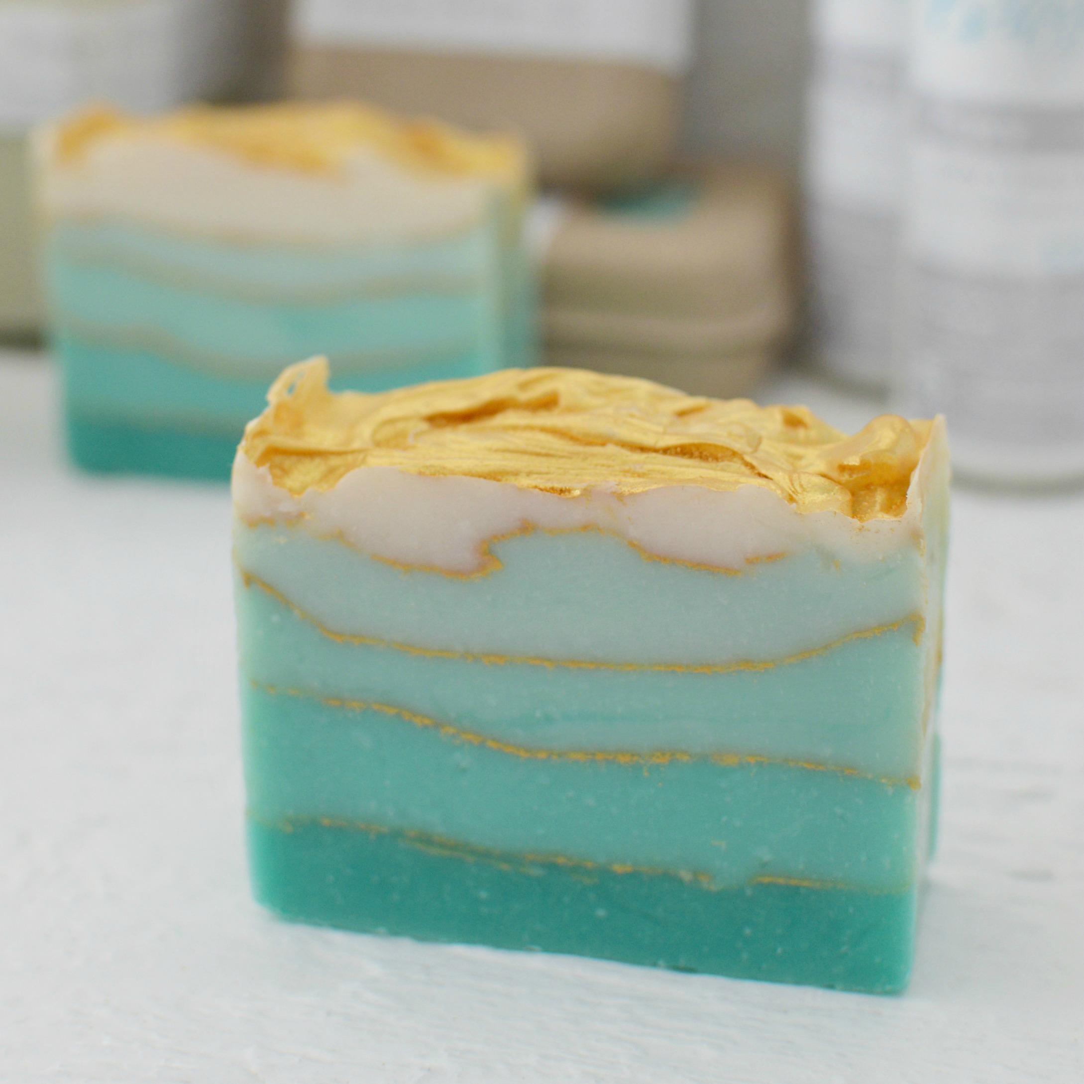 Introducing Foxy Body and Home Fragrance by foxhollowcottage.com - Artisanal small batch soap. Aqua ombre topped with golden sunshine.