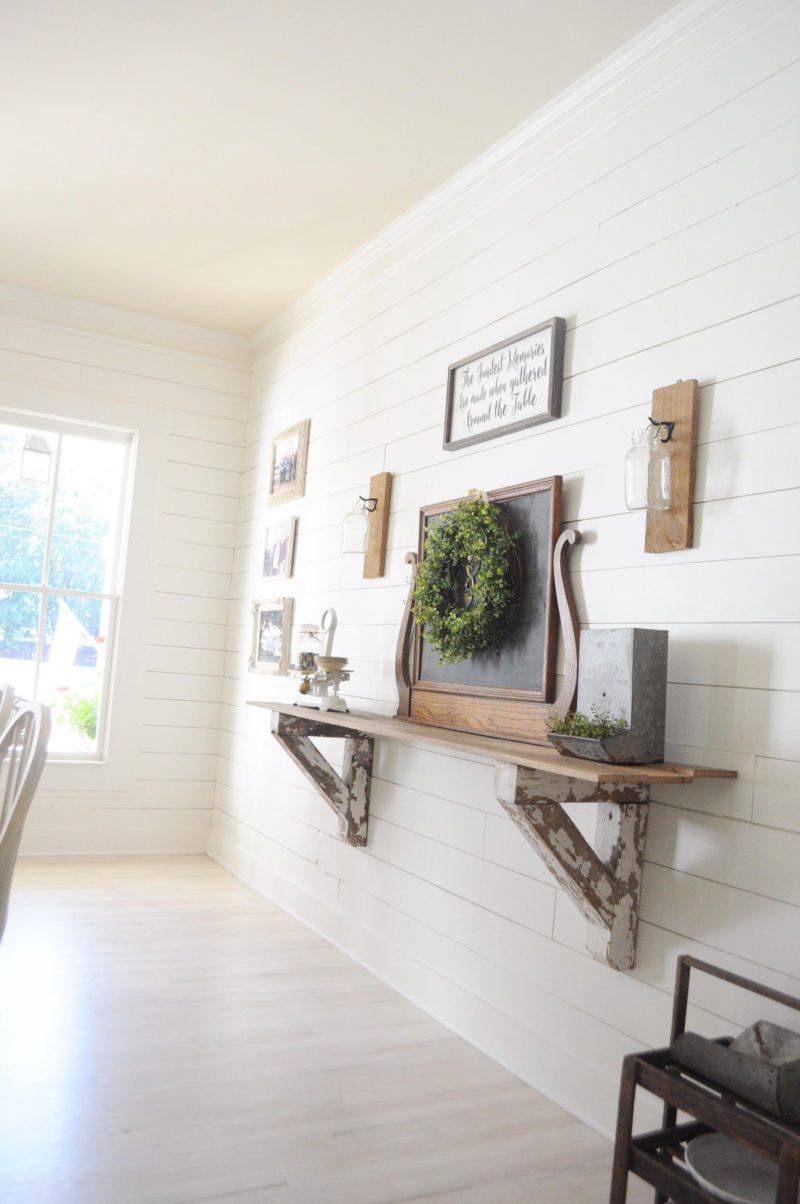 Farmhouse home tour - white shiplap dining room with corbel self and vintage chealkboard