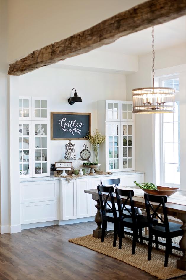 Custom Built Modern Farmhouse Home Tour with Household No 6 | White built in storage display, rustic barn wood beam, vaulted ceiling, wood floors and farm table dining