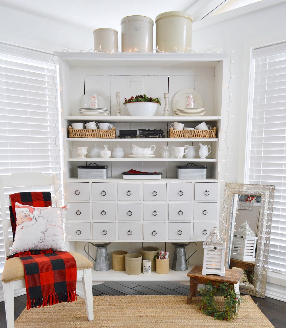Merry Christmas - Vintage holiday decorating, apothecary cabinet. Crock collection, plaid accents. 