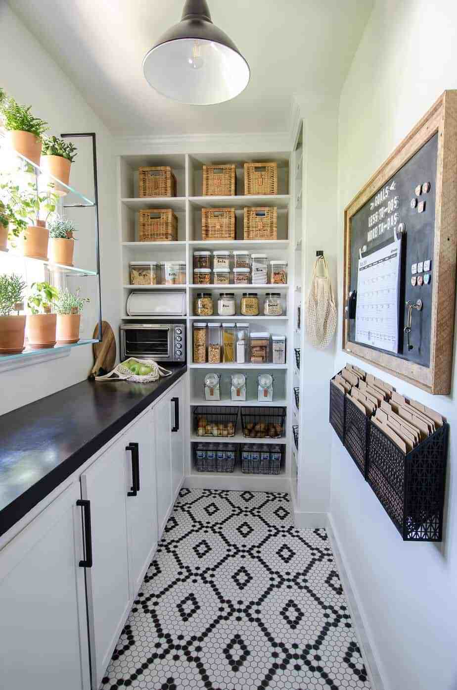 https://foxhollowcottage.com/wp-content/uploads/2020/03/20-Real-Life-DIY-Pantry-Makeovers-With-Organizing-Tips-And-Ideas-at-Fox-Hollow-Cottage-A-narrow-walk-in-pantry-with-counters-and-open-shelving-remincient-of-a-butlers-pantry.jpg