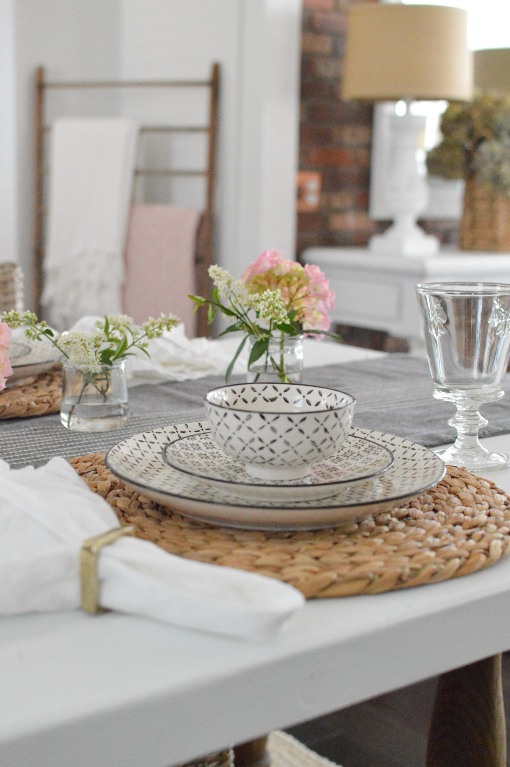 https://foxhollowcottage.com/wp-content/uploads/2021/06/Casual-table-setting-Norden-dishes-black-white-hydrangeas-honeysuckle-affordable-easy-decorating-ideas-at-Fox-Hollow-Cottage_-10-scaled.jpg